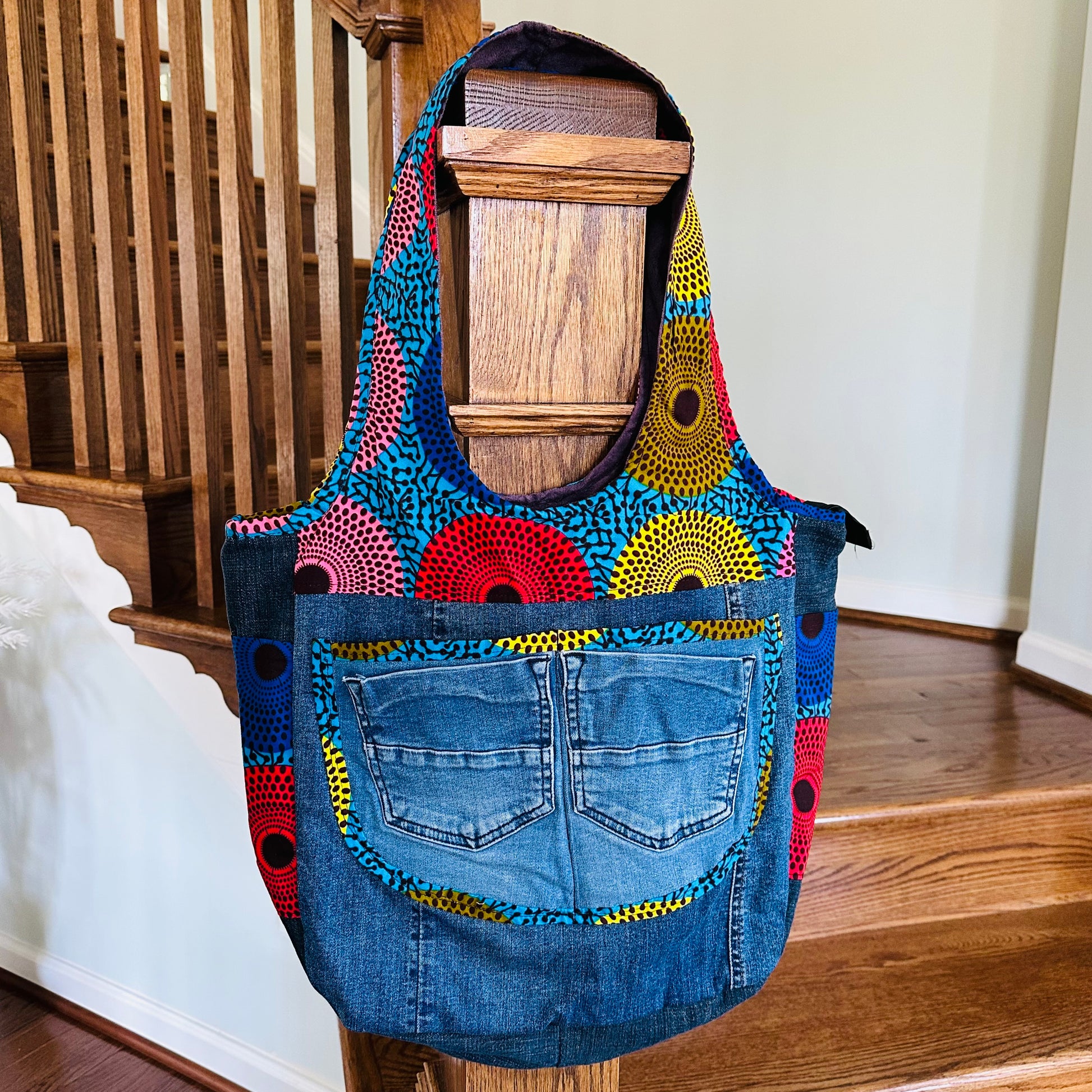 Denim bag with African print design.