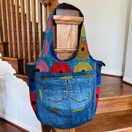 Denim bag with African print design.