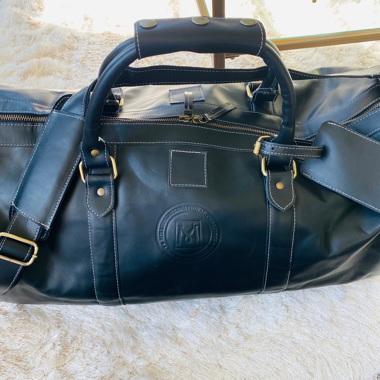 Millie’s Signature Duffel Bags