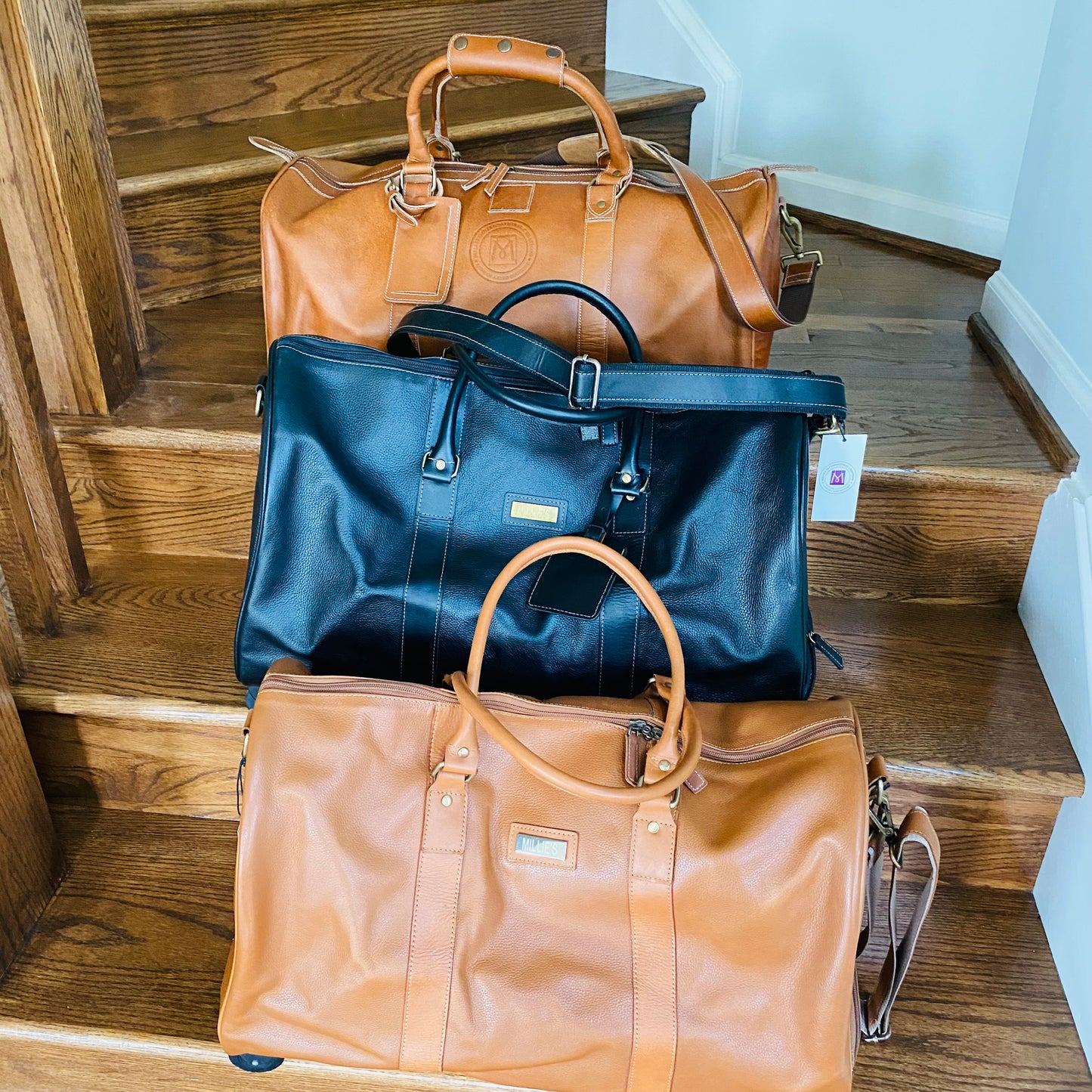 Millie’s Signature Duffel Bags